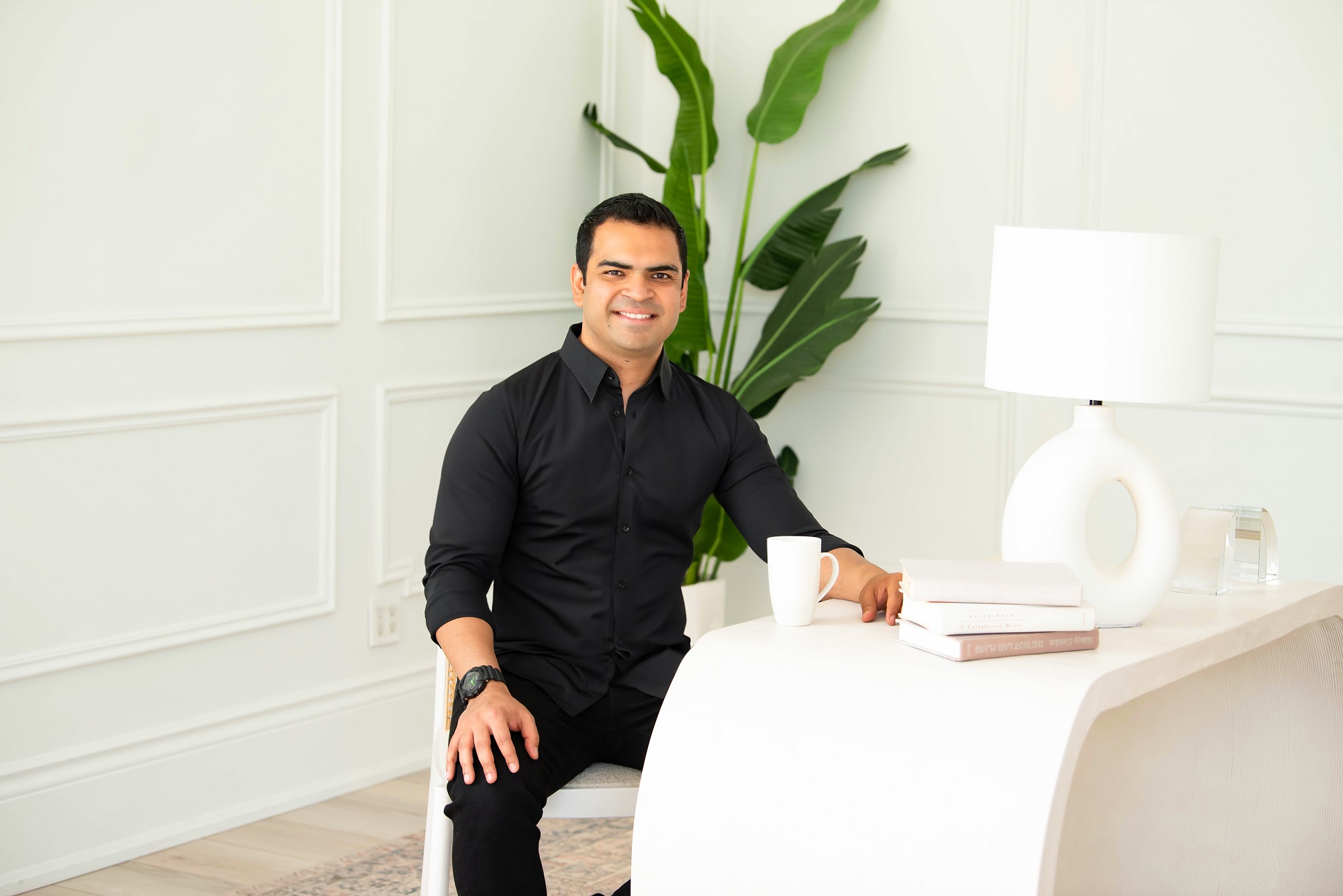 Harry Narang seated in his office